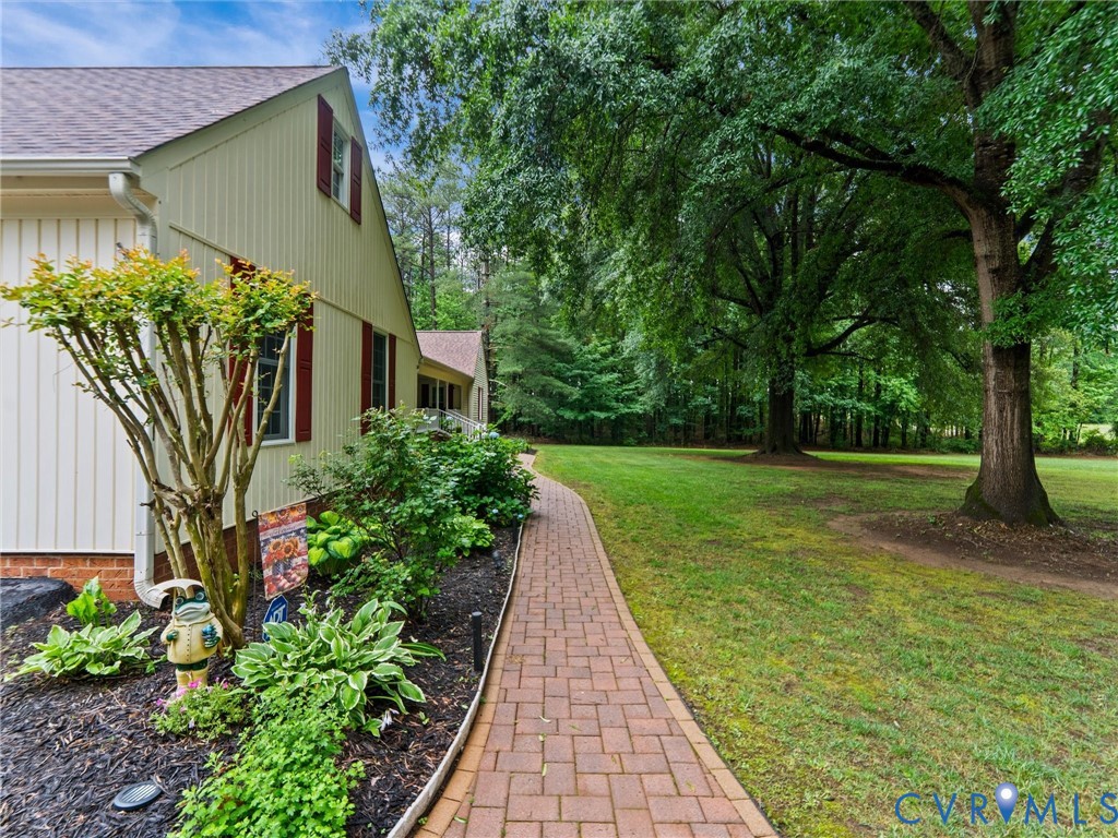3420 State Rte 656 Powhatan, VA 23139 - Photo 3 of 37 a view of a back yard with flower plants