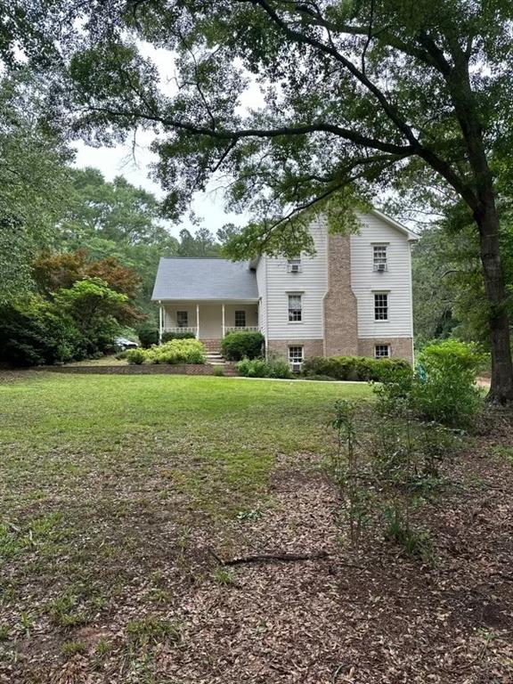 a house view with a garden space