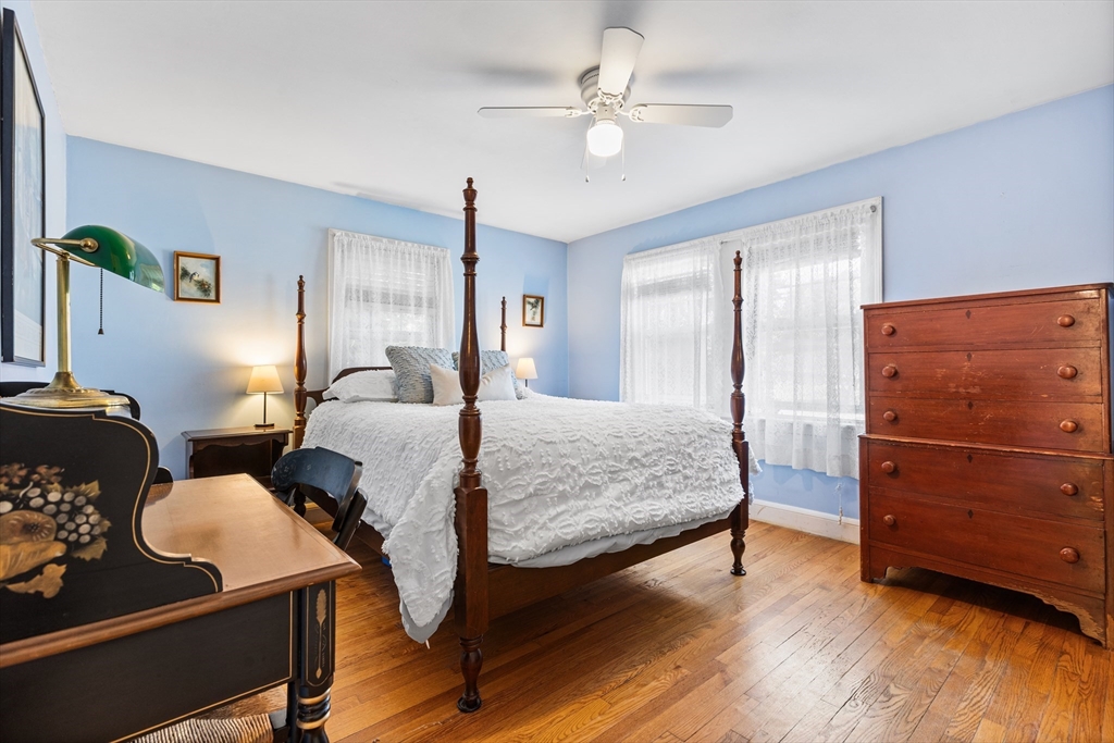 40 Bonad Road Stoneham, MA 02180 - Photo 16 of 38 a bedroom with a bed and dresser