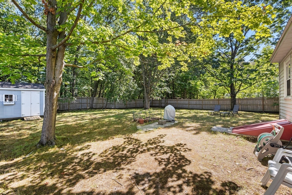 40 Bonad Road Stoneham, MA 02180 - Photo 24 of 38 a view of a yard with swimming pool