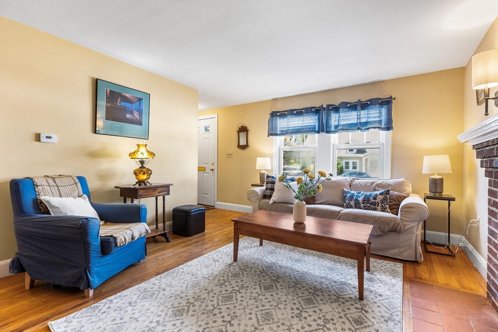 40 Bonad Road Stoneham, MA 02180 - Photo 3 of 38 a living room with furniture and a large window
