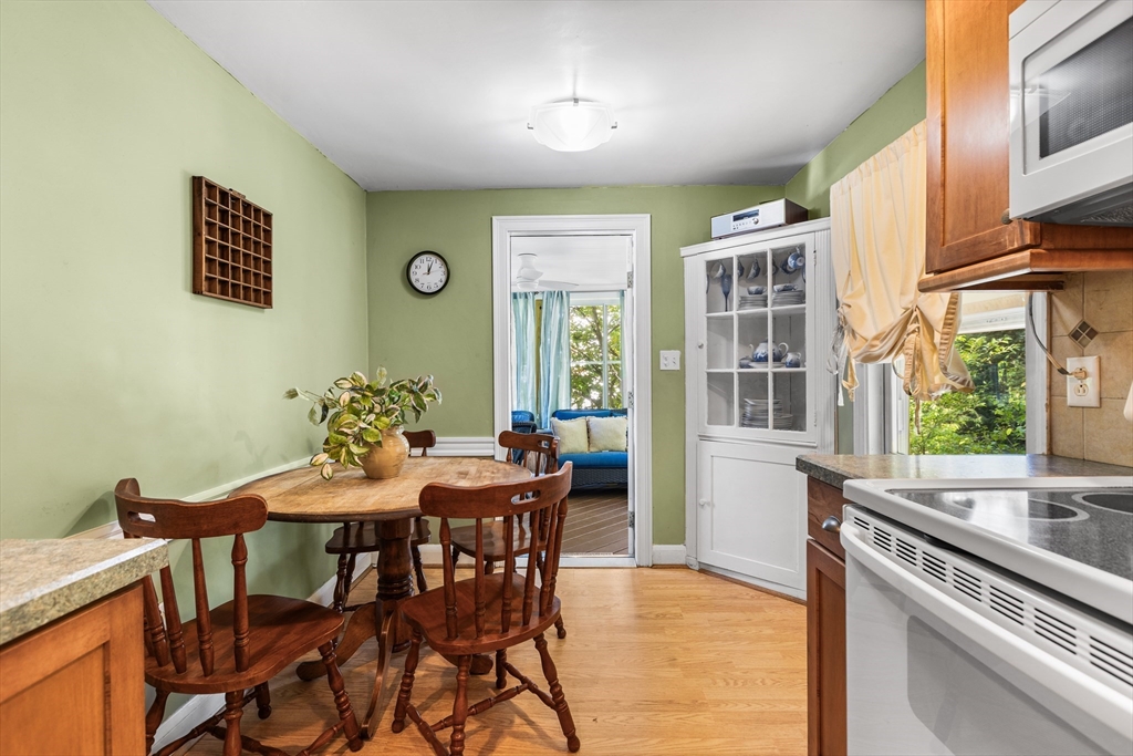 40 Bonad Road Stoneham, MA 02180 - Photo 9 of 38 a view of a dining room with furniture window and outside view