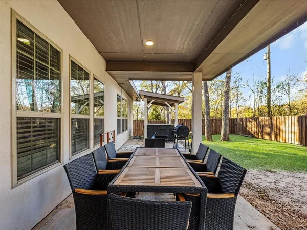 front view of a house with a patio