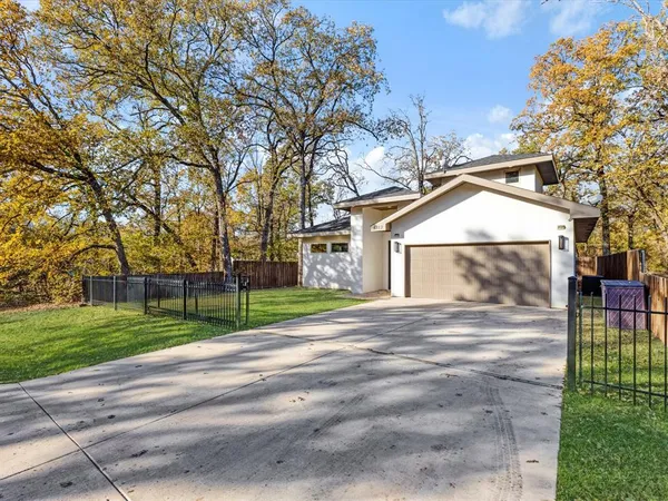 a view of road and fence