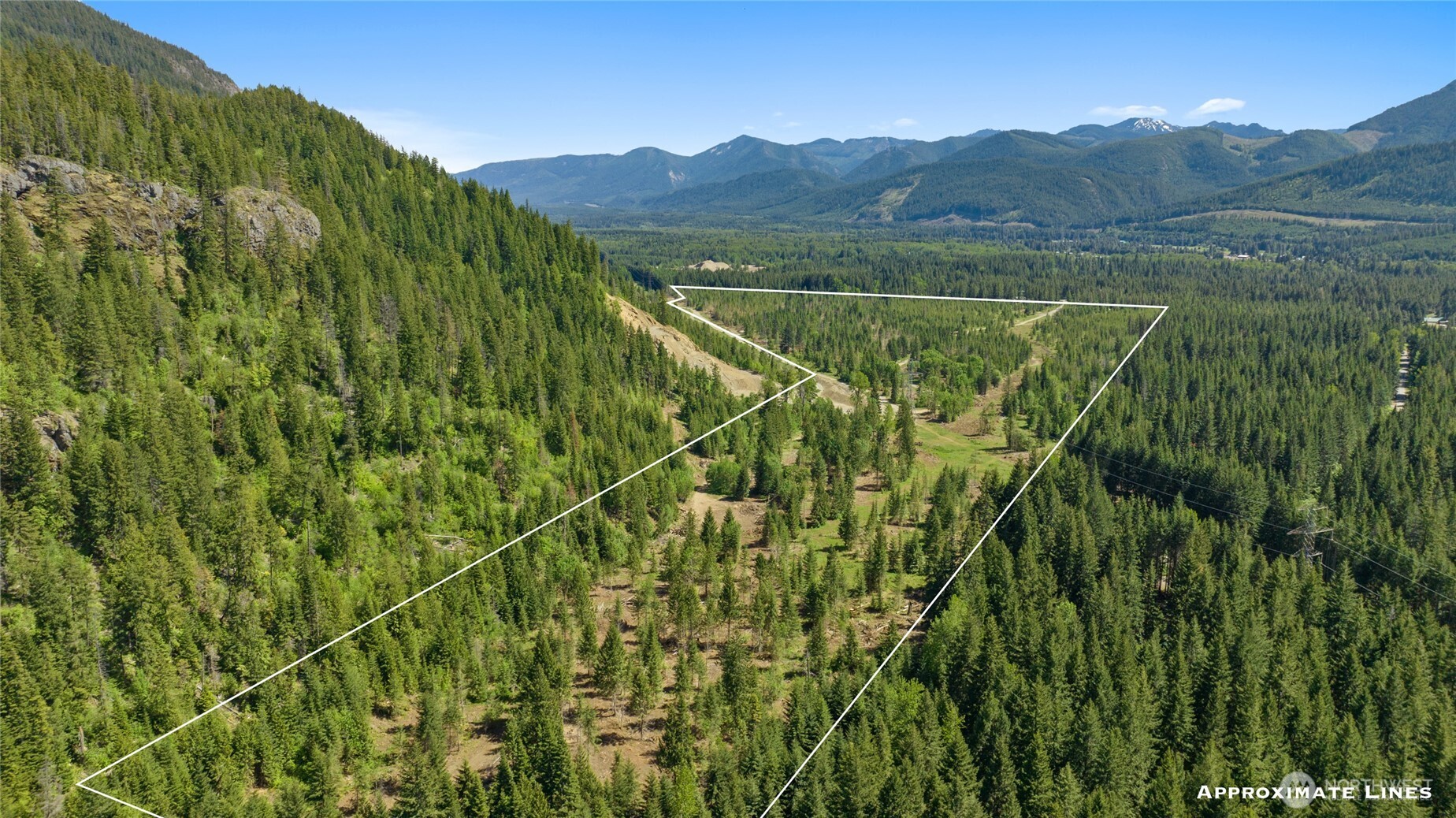 1 East Sparks Road Easton, WA 98925 - Photo 5 of 21 a view of a lush green field with a lake