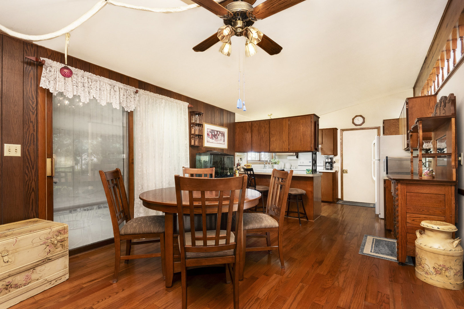 2S810 Bliss Road Batavia, IL 60510 - Photo 16 of 28 a view of a dining room with furniture window and wooden floor
