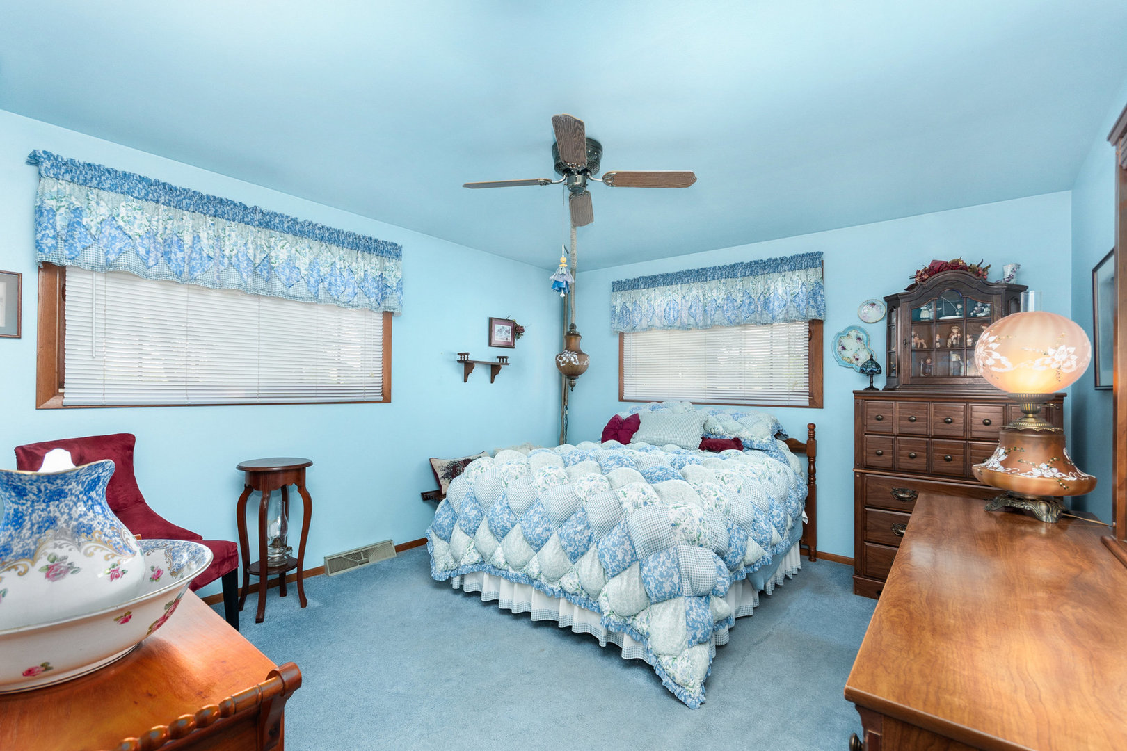 2S810 Bliss Road Batavia, IL 60510 - Photo 20 of 28 a bedroom with bed and a chandelier