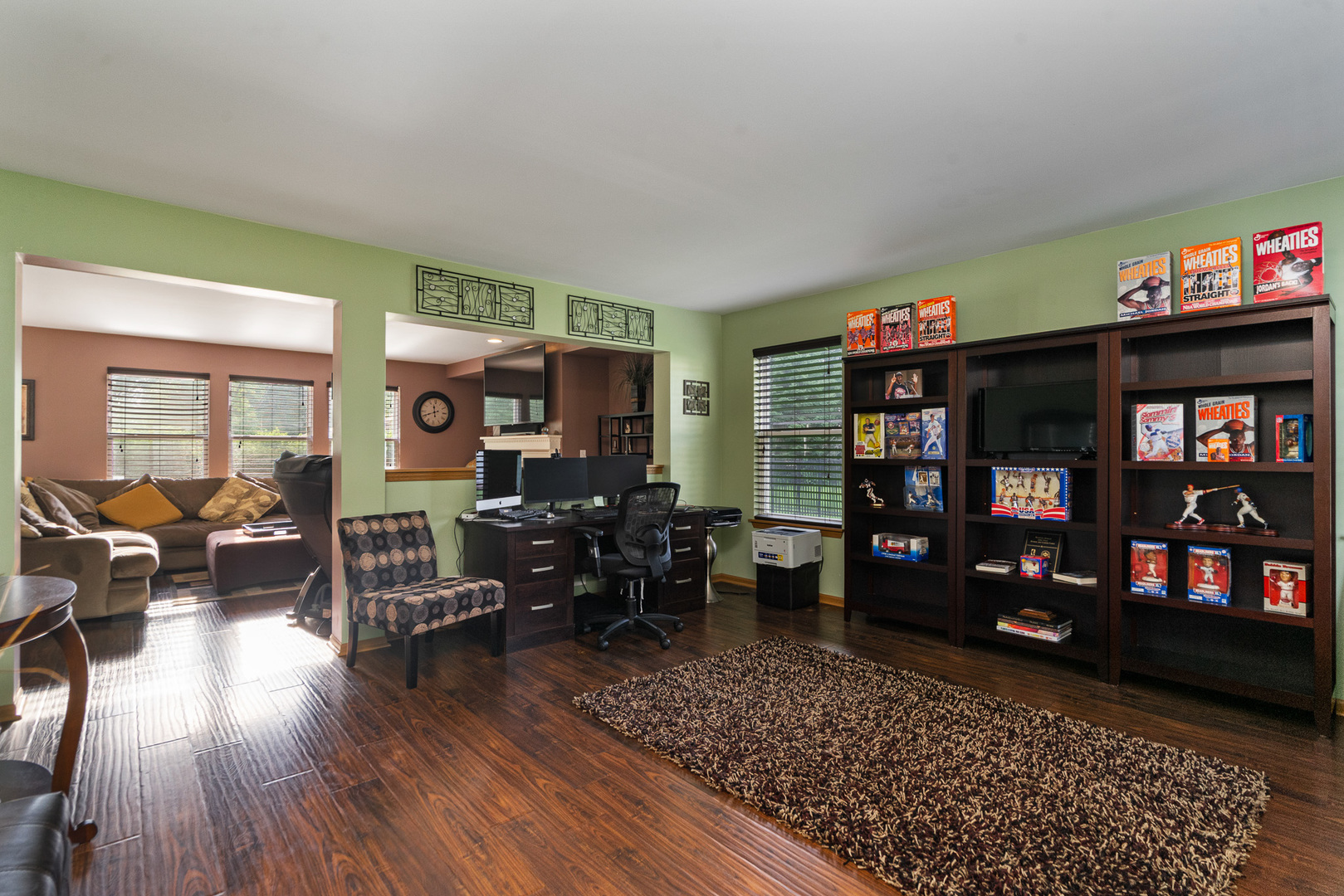 16320 Spring Creek Lane Plainfield, IL 60586 - Photo 4 of 40 a living room with furniture and wooden floor