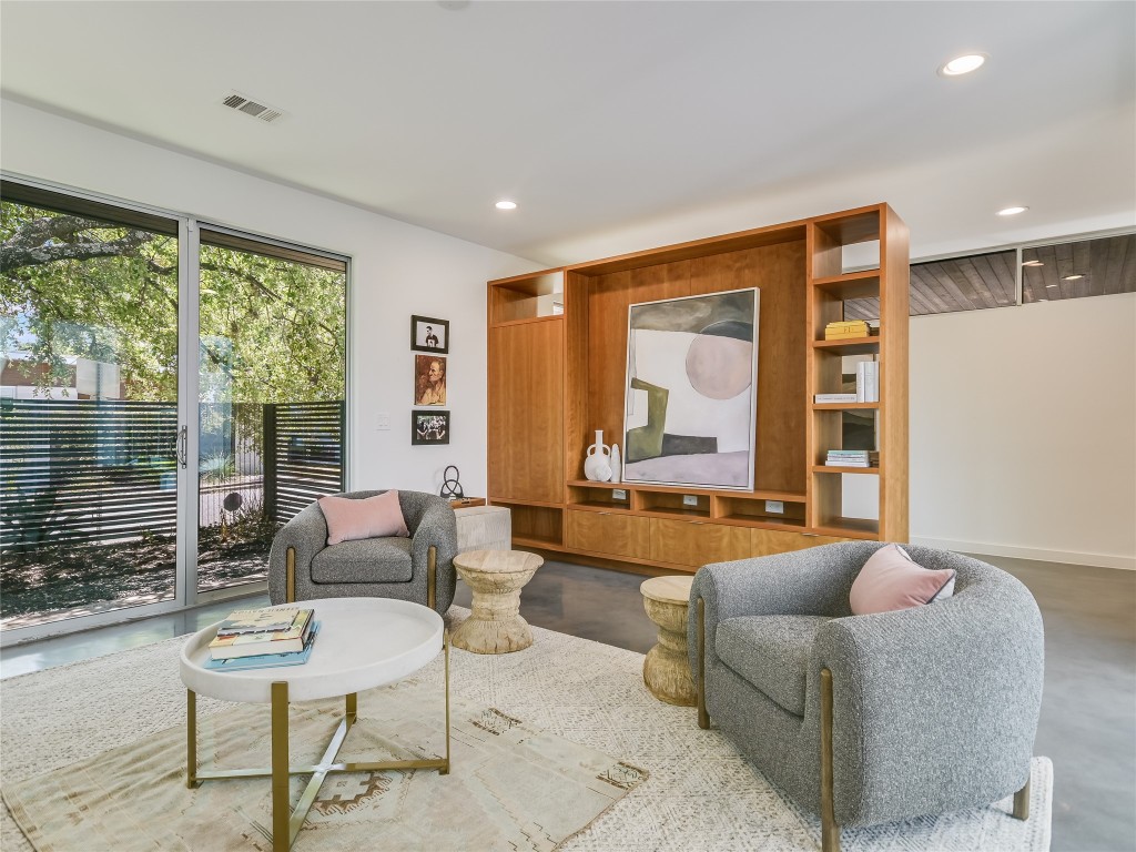 1012 East 15th Street Austin, TX 78702 - Photo 1 of 1 a living room with furniture and a large window