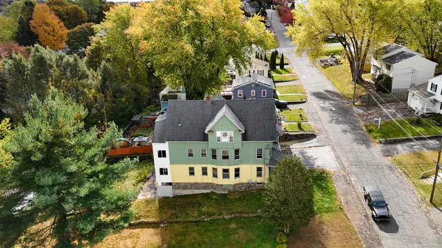 a kitchen with a refrigerator and a stove