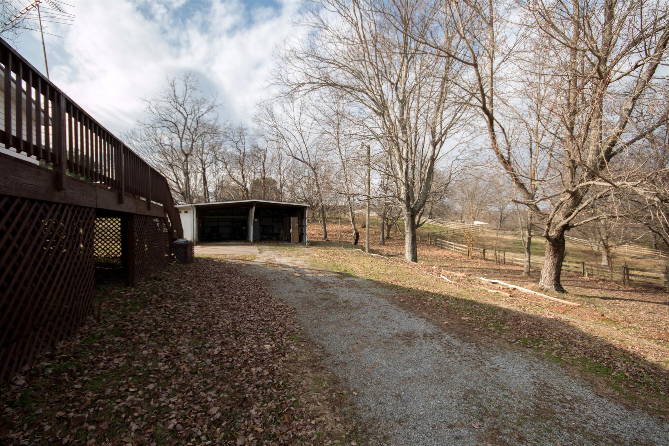 149 Mitchell Road Portland, TN 37148 - Photo 13 of 29 a front view of a house with a yard