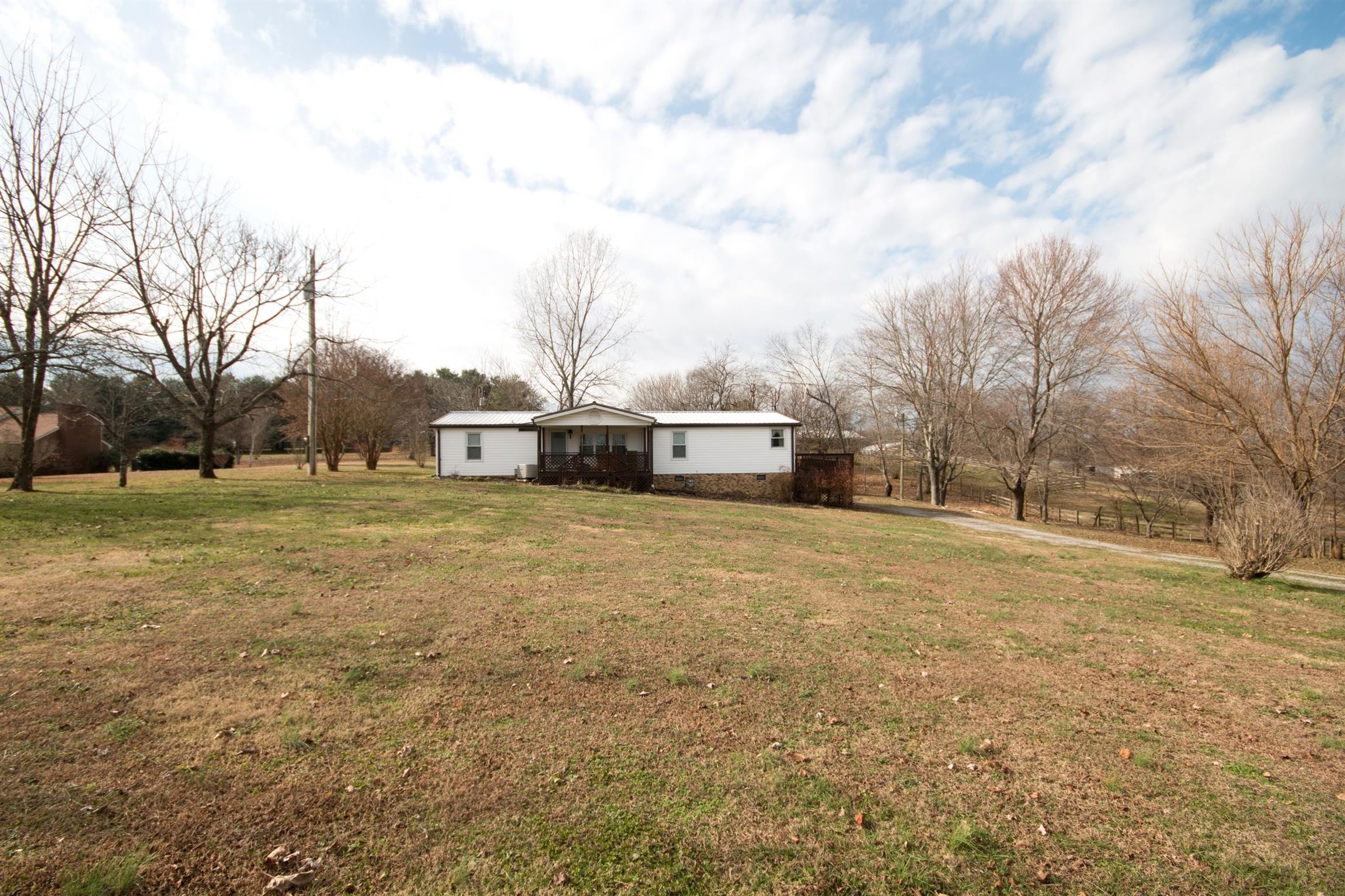 149 Mitchell Road Portland, TN 37148 - Photo 2 of 29 a view of road with residential houses