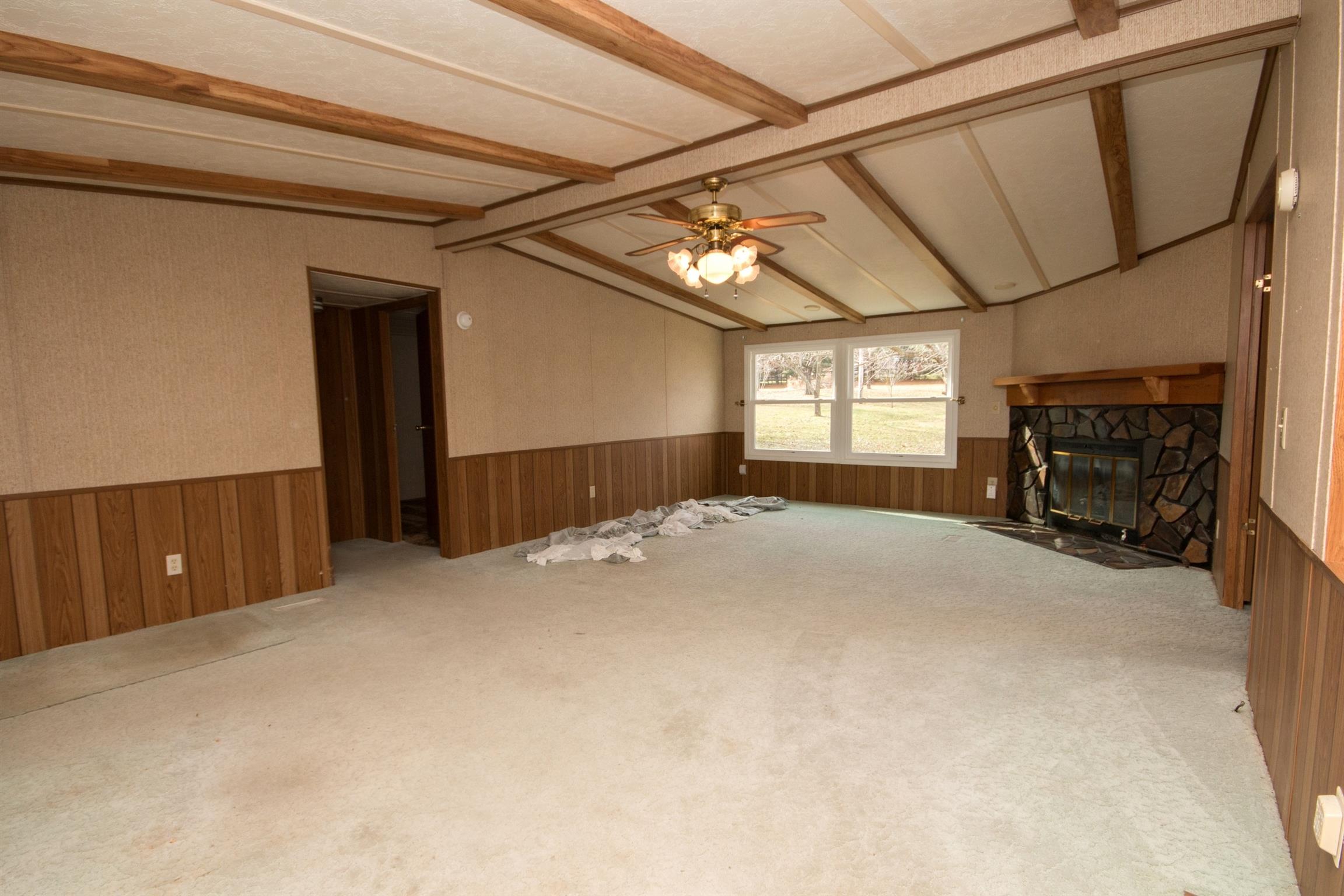149 Mitchell Road Portland, TN 37148 - Photo 23 of 29 a view of empty room with fireplace and window