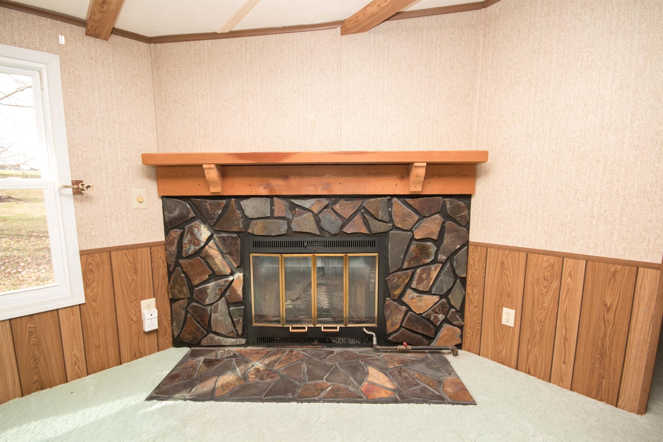 149 Mitchell Road Portland, TN 37148 - Photo 24 of 29 a view of a fireplace and a window