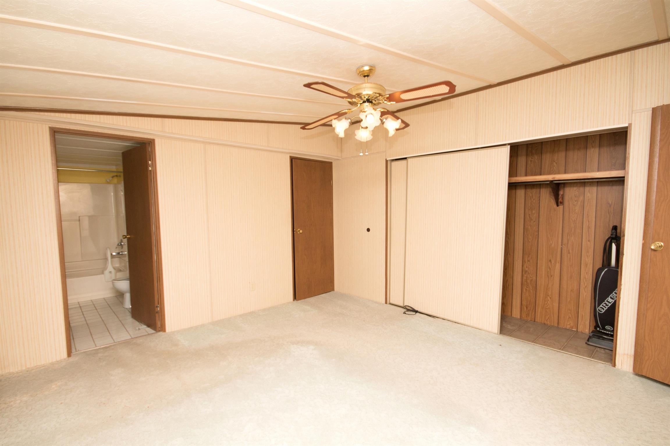 149 Mitchell Road Portland, TN 37148 - Photo 27 of 29 a view of empty room with ceiling fan