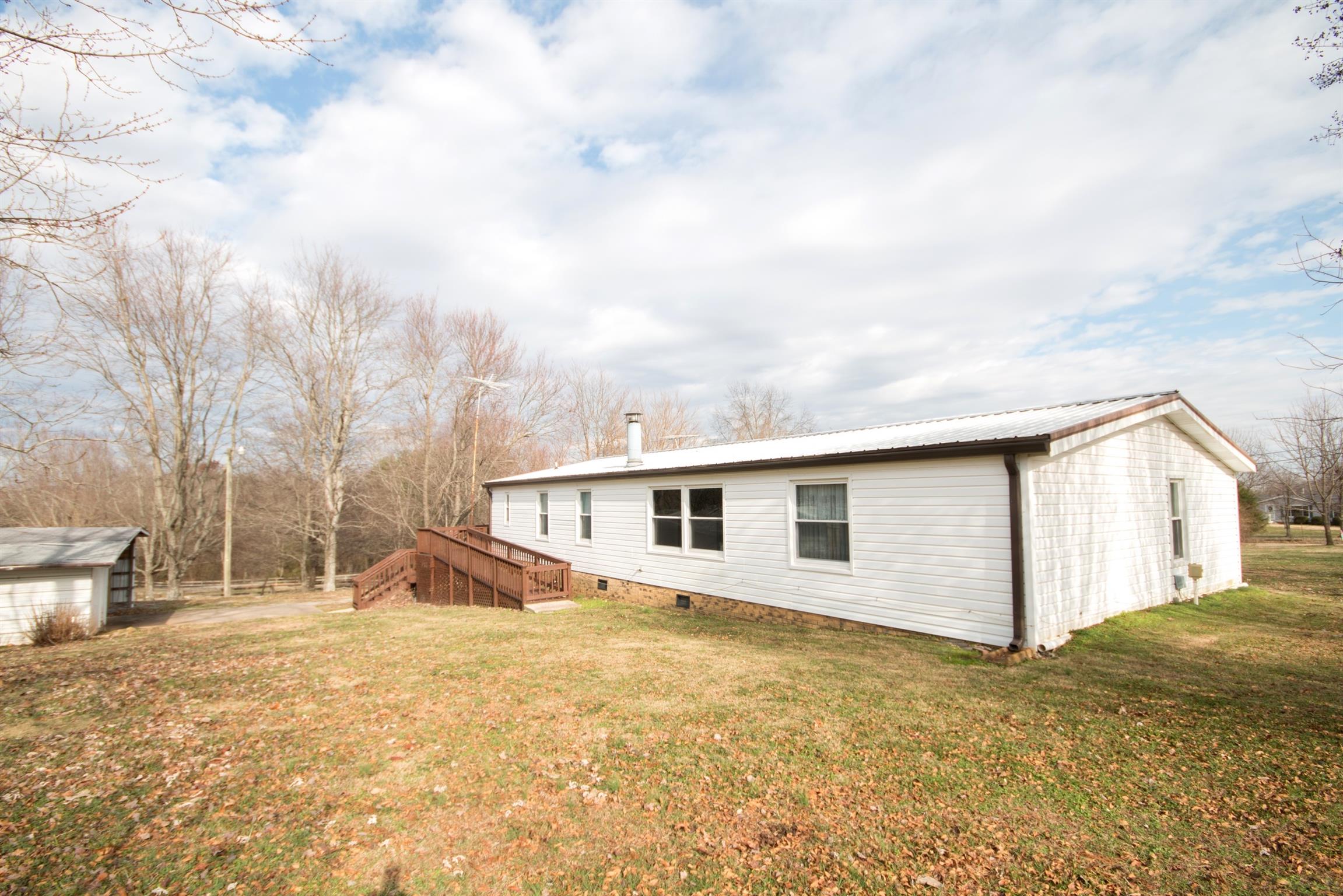 149 Mitchell Road Portland, TN 37148 - Photo 5 of 29 a view of a house with snow on the road