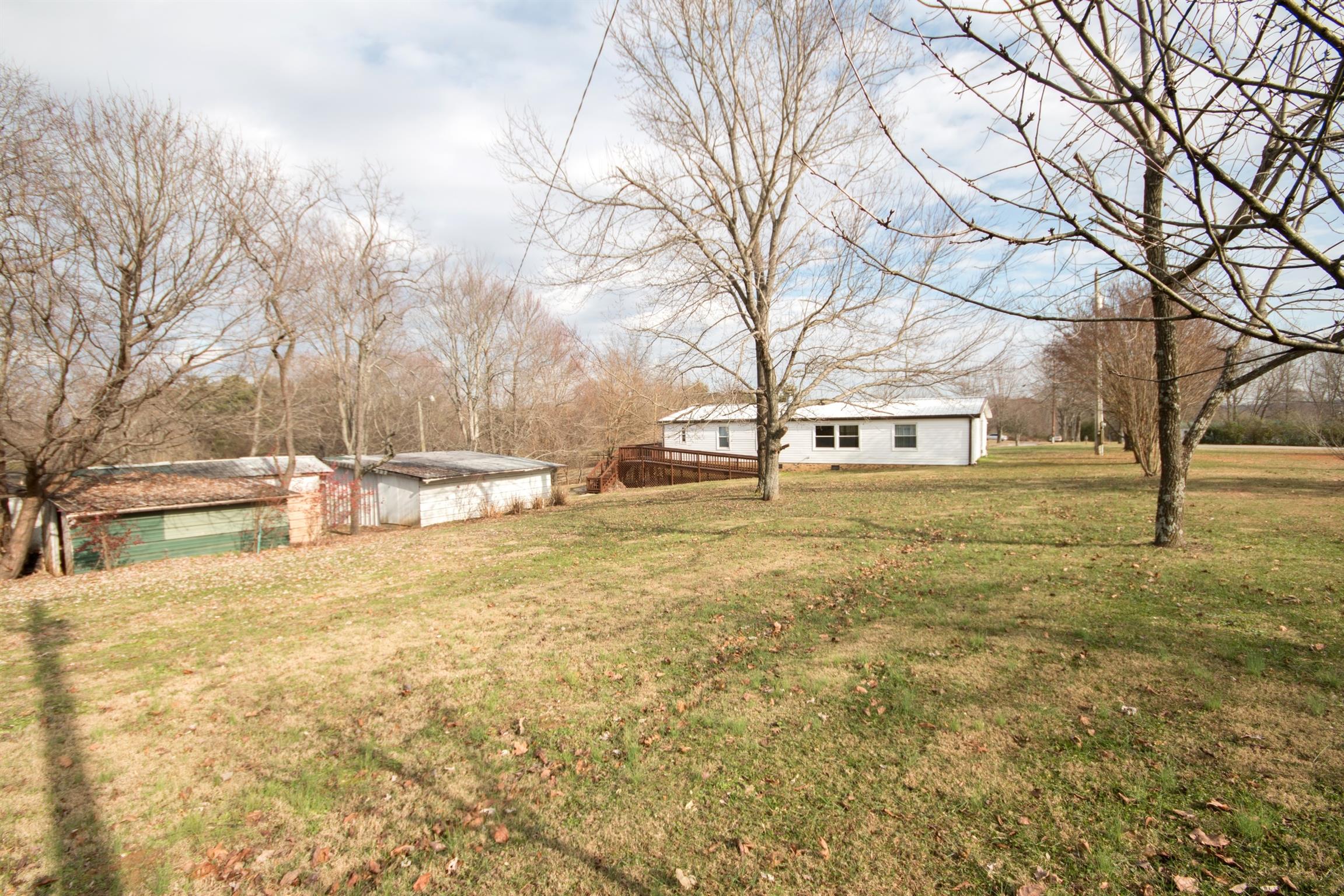 149 Mitchell Road Portland, TN 37148 - Photo 6 of 29 a view of yard with large trees
