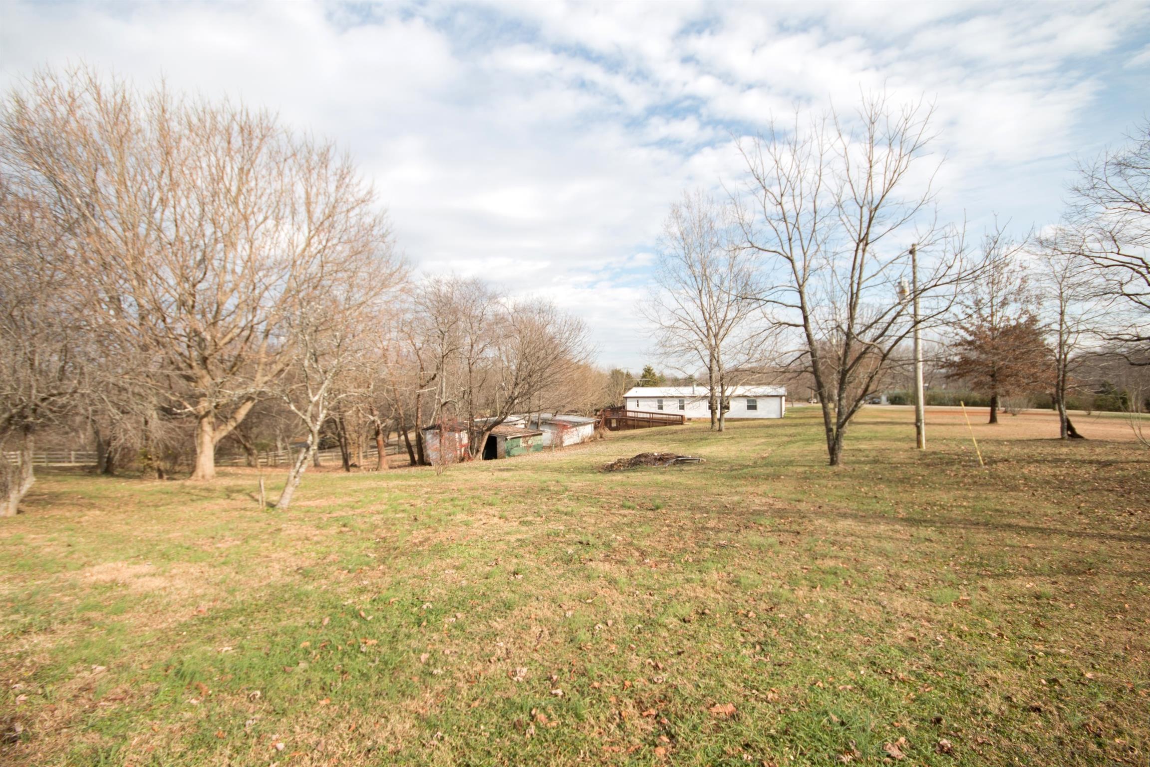 149 Mitchell Road Portland, TN 37148 - Photo 7 of 29 a view of yard with trees