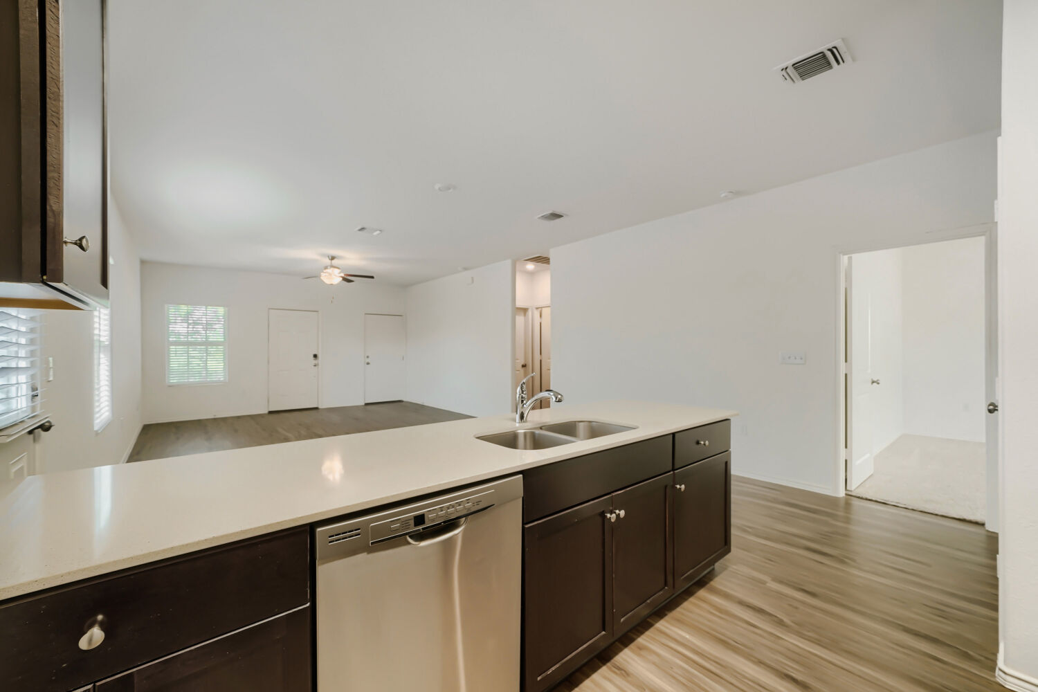 7001 Tonka Lane Austin, TX 78744 - Photo 12 of 30 a kitchen with a sink and cabinets