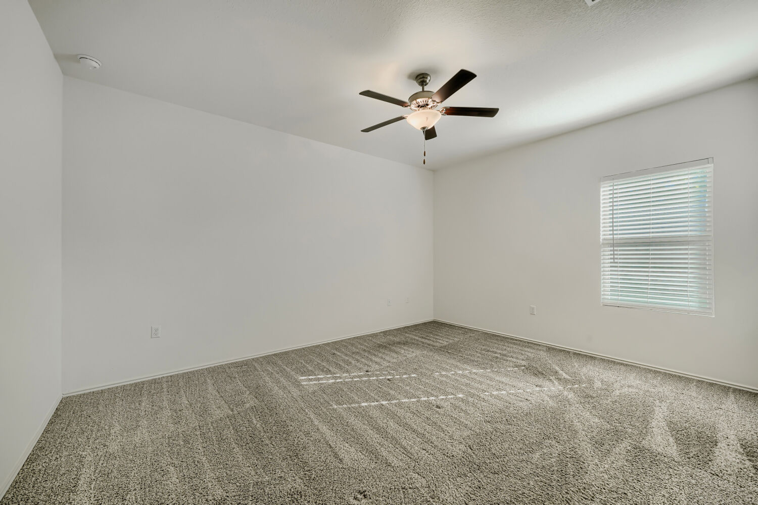 7001 Tonka Lane Austin, TX 78744 - Photo 14 of 30 a view of an empty room with a window