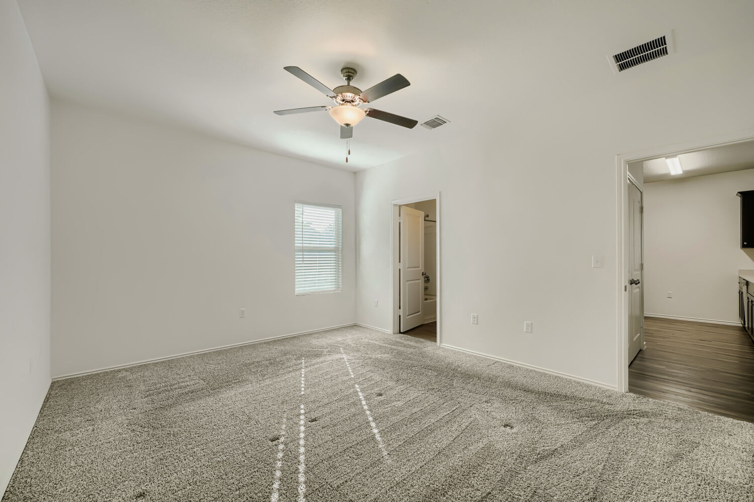 7001 Tonka Lane Austin, TX 78744 - Photo 16 of 30 a view of an empty room with a window