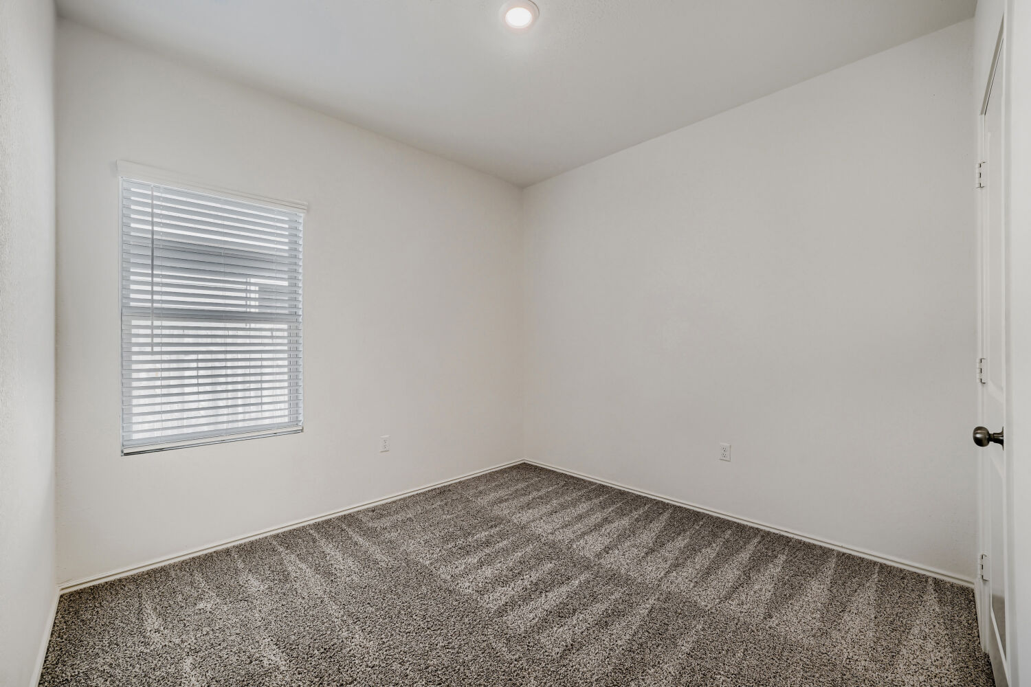 7001 Tonka Lane Austin, TX 78744 - Photo 20 of 30 an empty room with a window