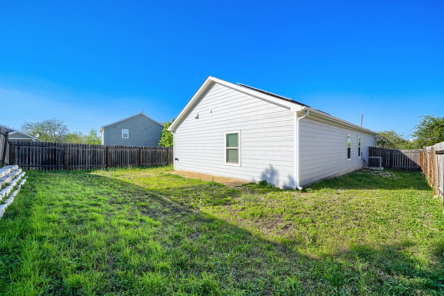 7001 Tonka Lane Austin, TX 78744 - Photo 25 of 30 a view of backyard with garden
