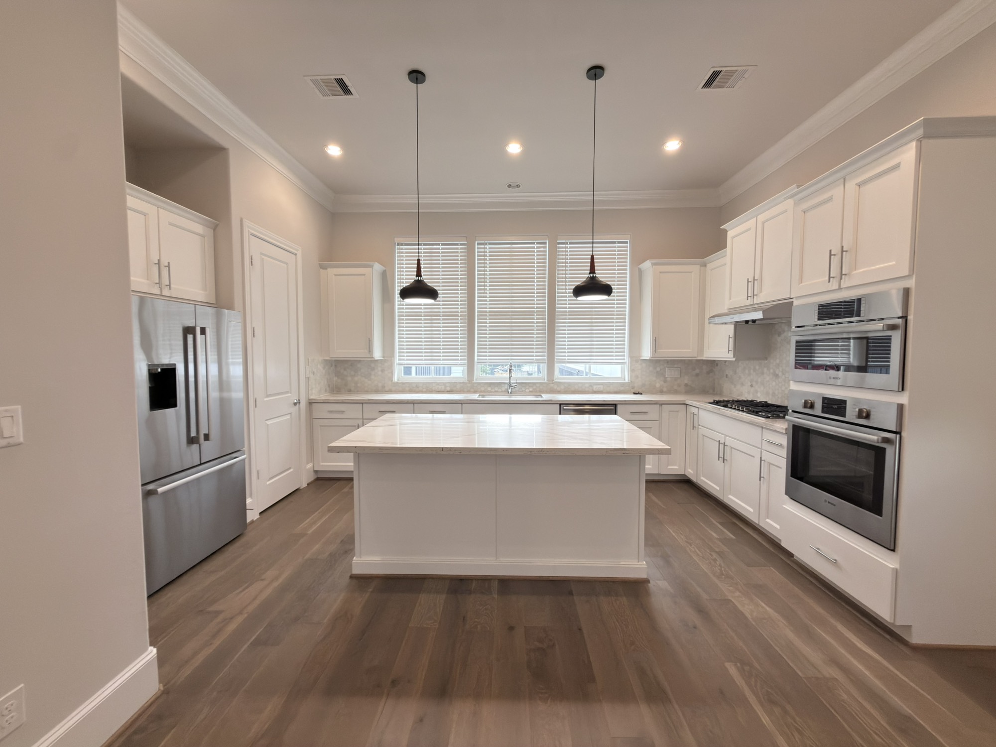815 Bringhurst Street Houston, TX 77020 - Photo 8 of 19 VIEW OF KITCHEN 2ND FLOOR