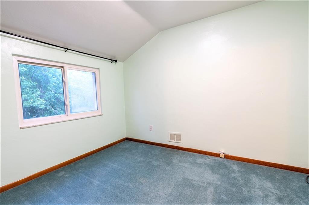 586 Filmore Road Pittsburgh, PA 15221 - Photo 19 of 25 an empty room with a window