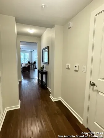wooden floor in a hall with an entryway