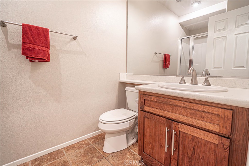 28772 Woodside Drive Saugus, CA 91390 - Photo 13 of 23 a bathroom with a sink and a toilet