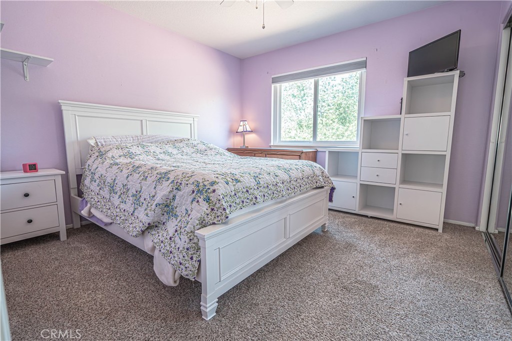 28772 Woodside Drive Saugus, CA 91390 - Photo 19 of 23 a bed room with a bed and a window