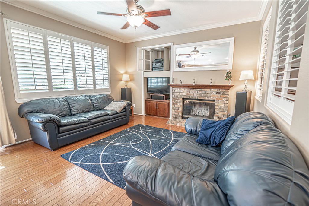 28772 Woodside Drive Saugus, CA 91390 - Photo 10 of 23 a living room with furniture fireplace and window