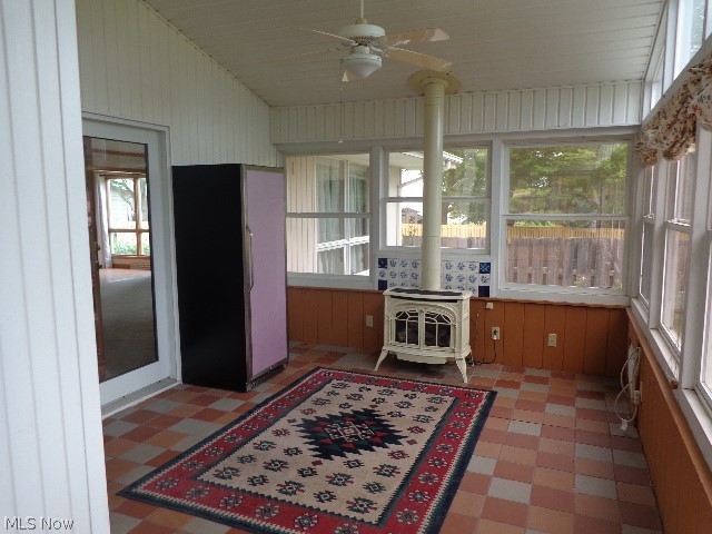7892 Doylestown Road Sterling, OH 44276 - Photo 7 of 35 Sunroom 2 with wood burning stove
