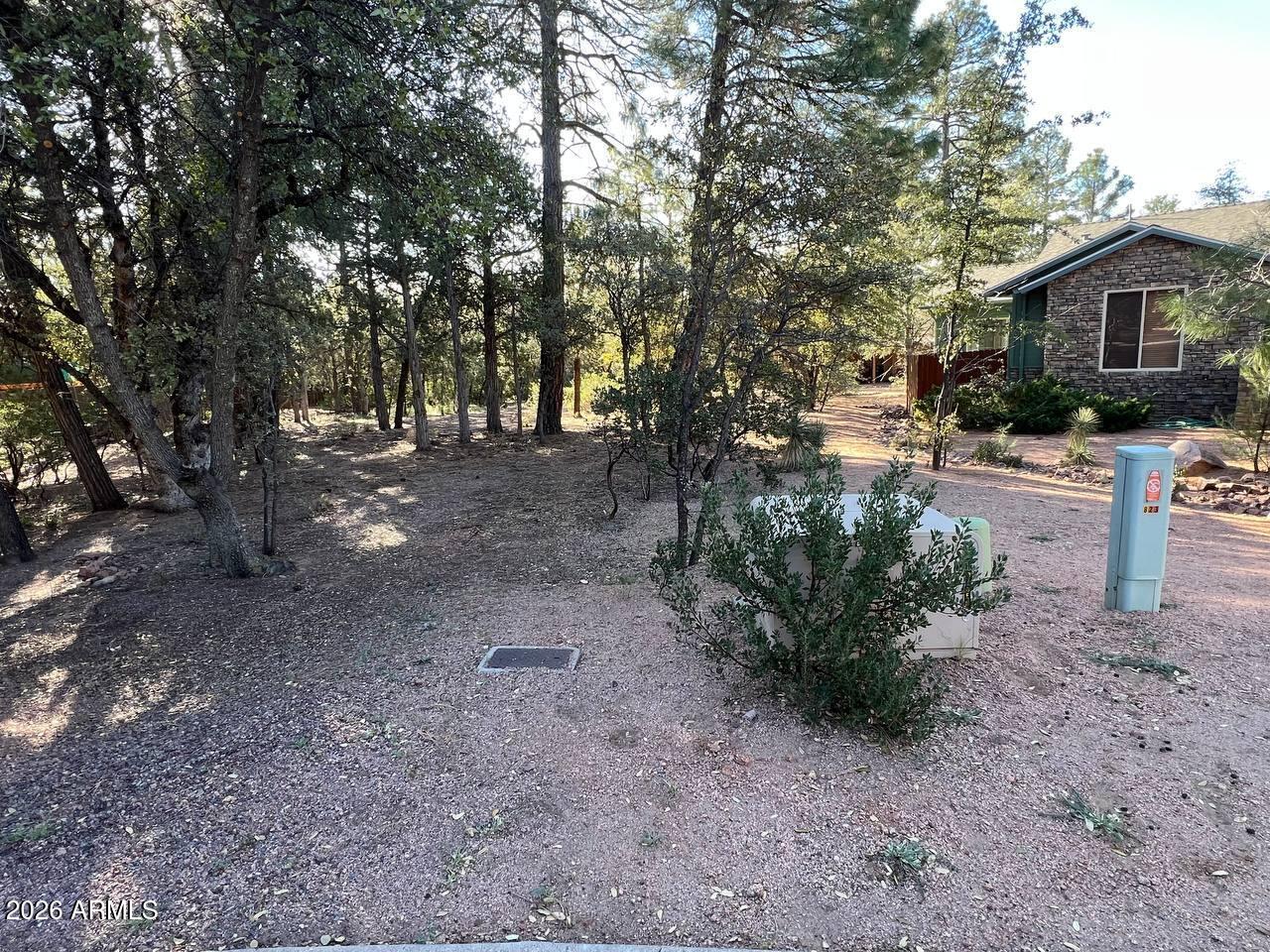 821 Eagle Ridge Circle Payson, AZ 85541 - Photo 4 of 7 a view of a house with a backyard and tree