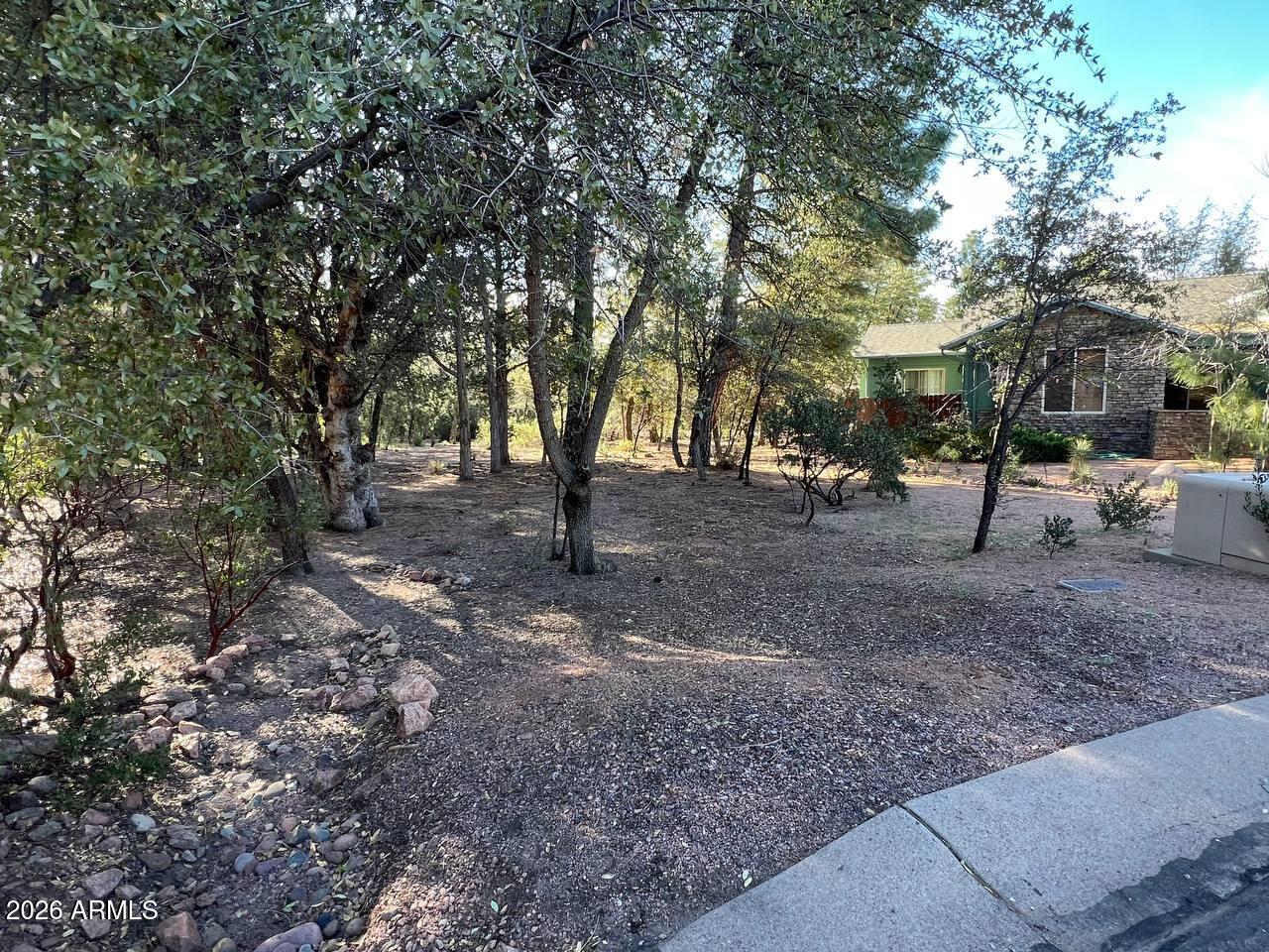 821 Eagle Ridge Circle Payson, AZ 85541 - Photo 6 of 7 a view of road with trees