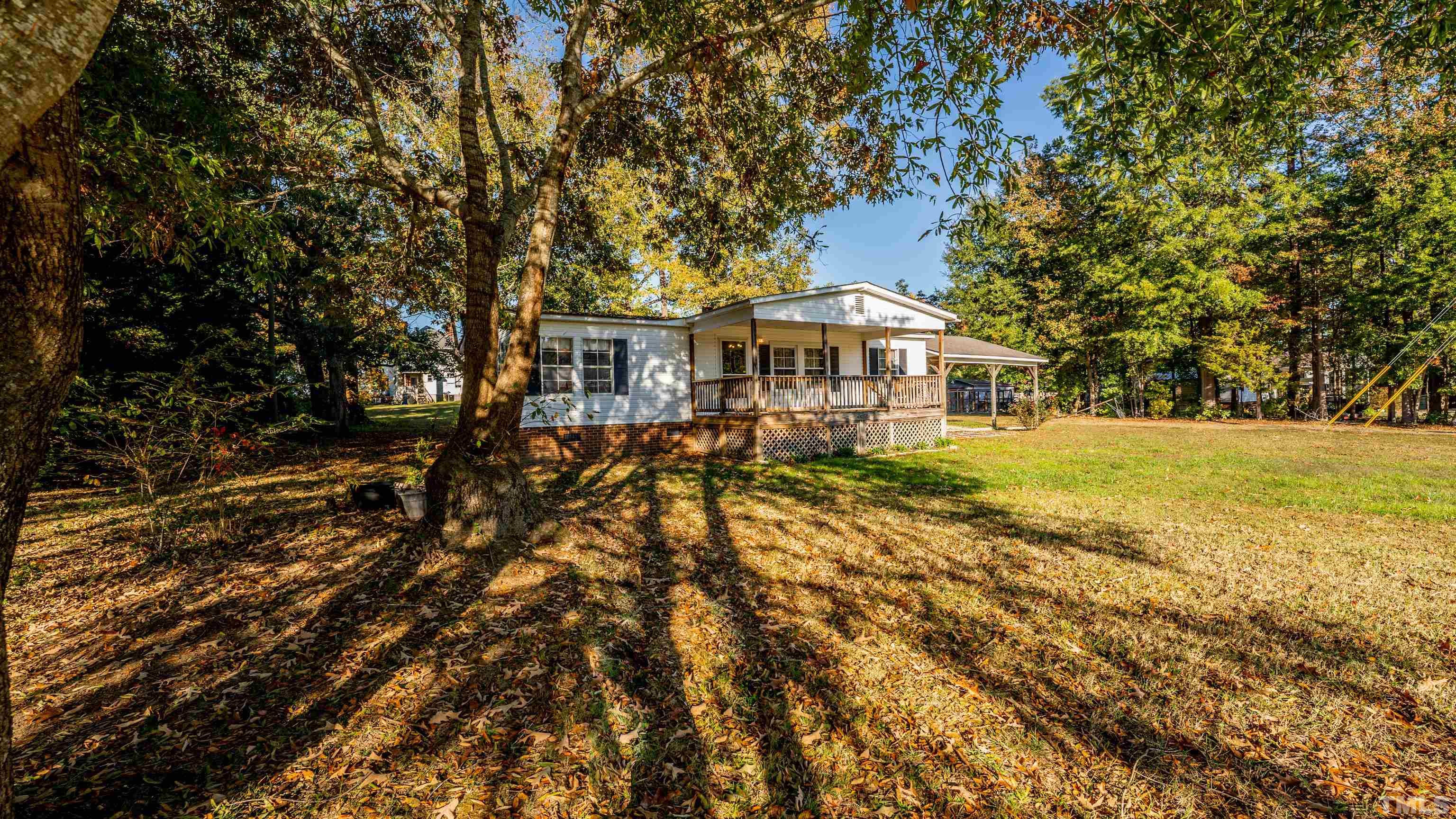 200 David Lane Roxboro, NC 27573 - Photo 19 of 38 a view of a house with a yard