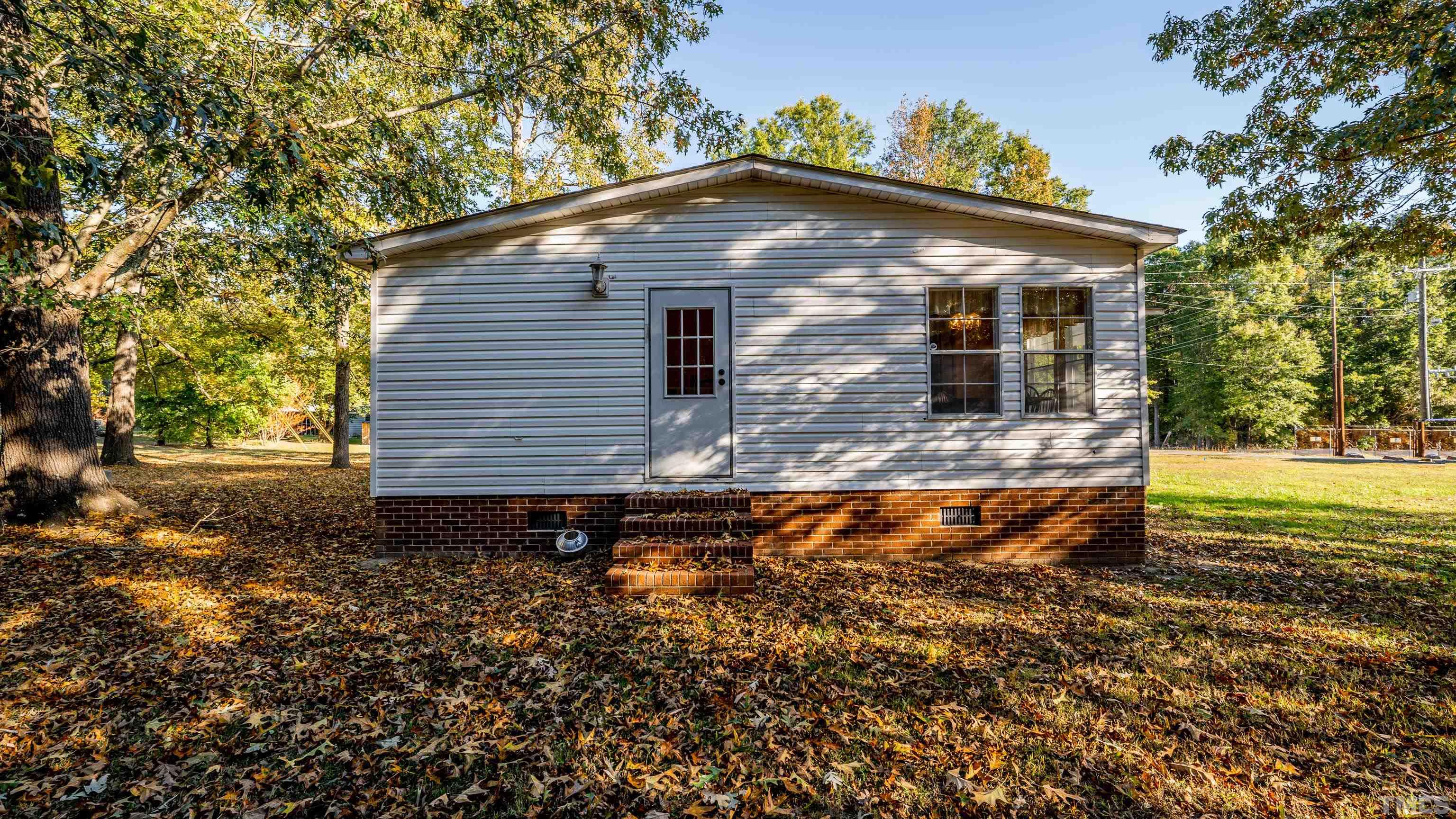 200 David Lane Roxboro, NC 27573 - Photo 35 of 38 a front view of house with yard