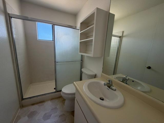 2601 Temperate Court Modesto, CA 95358 - Photo 19 of 24 a bathroom with a sink toilet and shower
