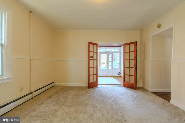 an empty room with windows