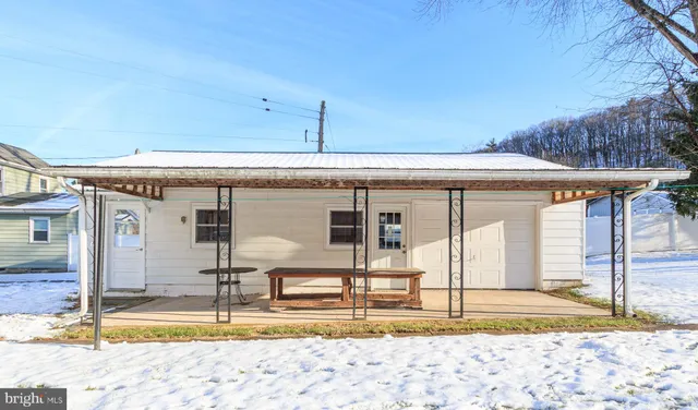 a view of a house with a swimming pool