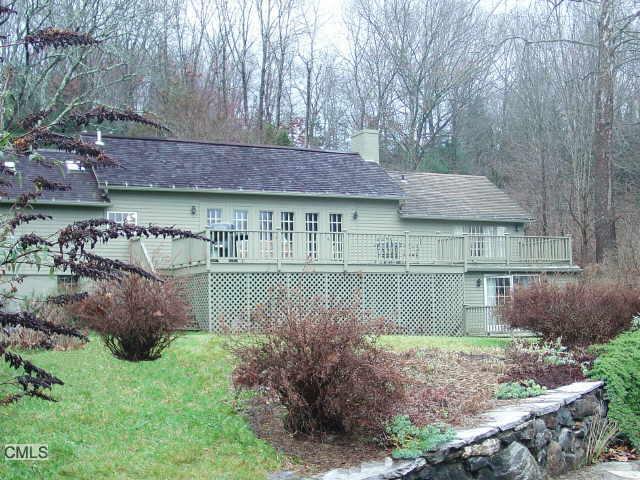 201 River Road Roxbury, CT 06783 - Photo 1 of 1 a view of a house with a garden