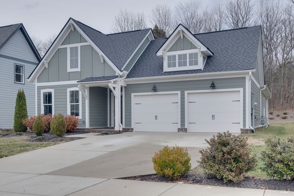 713 Plowson Road Mount Juliet, TN 37122 - Photo 2 of 33 a front view of a house with garden