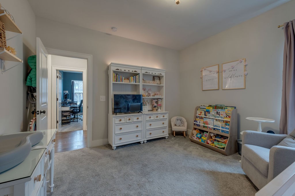 713 Plowson Road Mount Juliet, TN 37122 - Photo 25 of 33 a bedroom with furniture and a flat screen tv