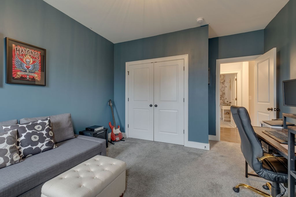 713 Plowson Road Mount Juliet, TN 37122 - Photo 28 of 33 a living room with furniture and a window