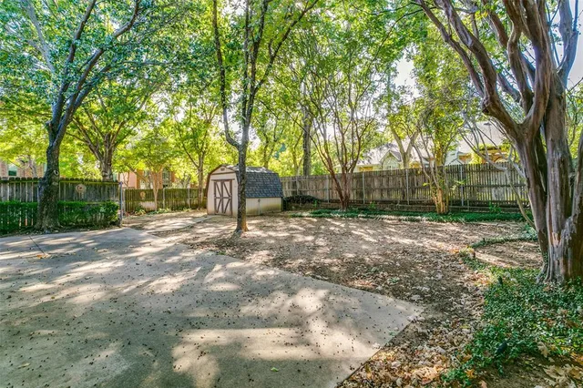 a backyard of a house with lots of green space