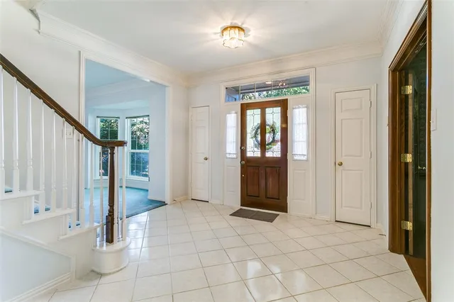 a view of an entryway with front door