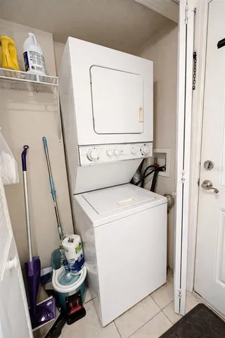 a view of a balcony with chair and table