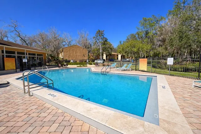 a view of a living room and workspace