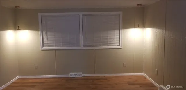 a white stove top oven sitting inside of a kitchen